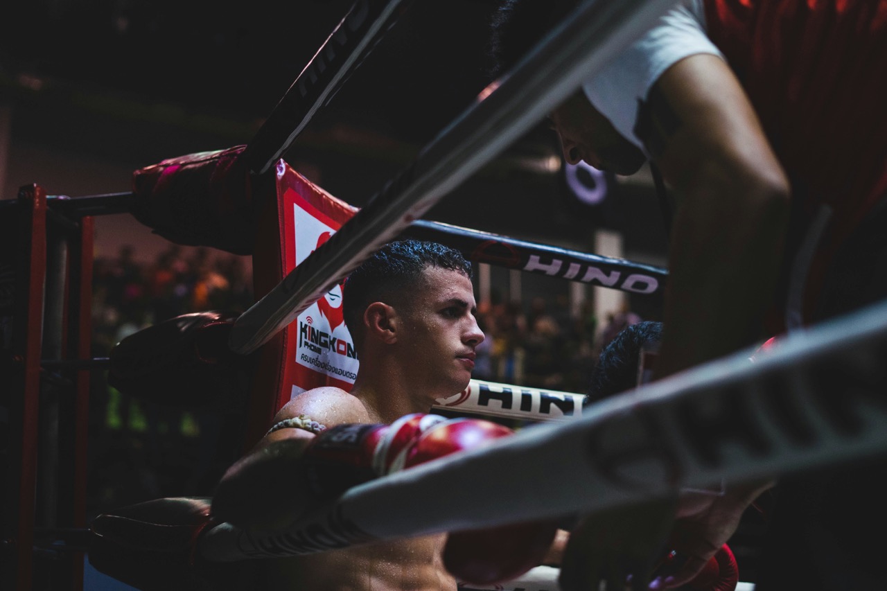 Boxer recovering calmly in the corner while listening to one coaching cue